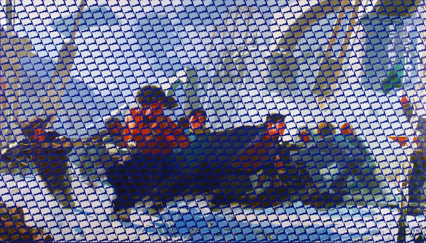 Close-up of a woven fabric with blue and orange patterns